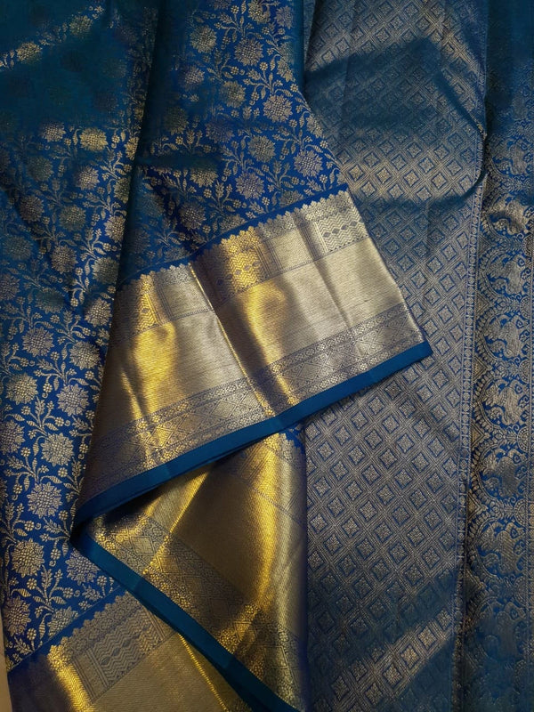2G Kanjivaram Silk Saree in Peacock Blue with Rich Gold Zari Floral Brocade & Traditional Broad Border | Silkmark Certified