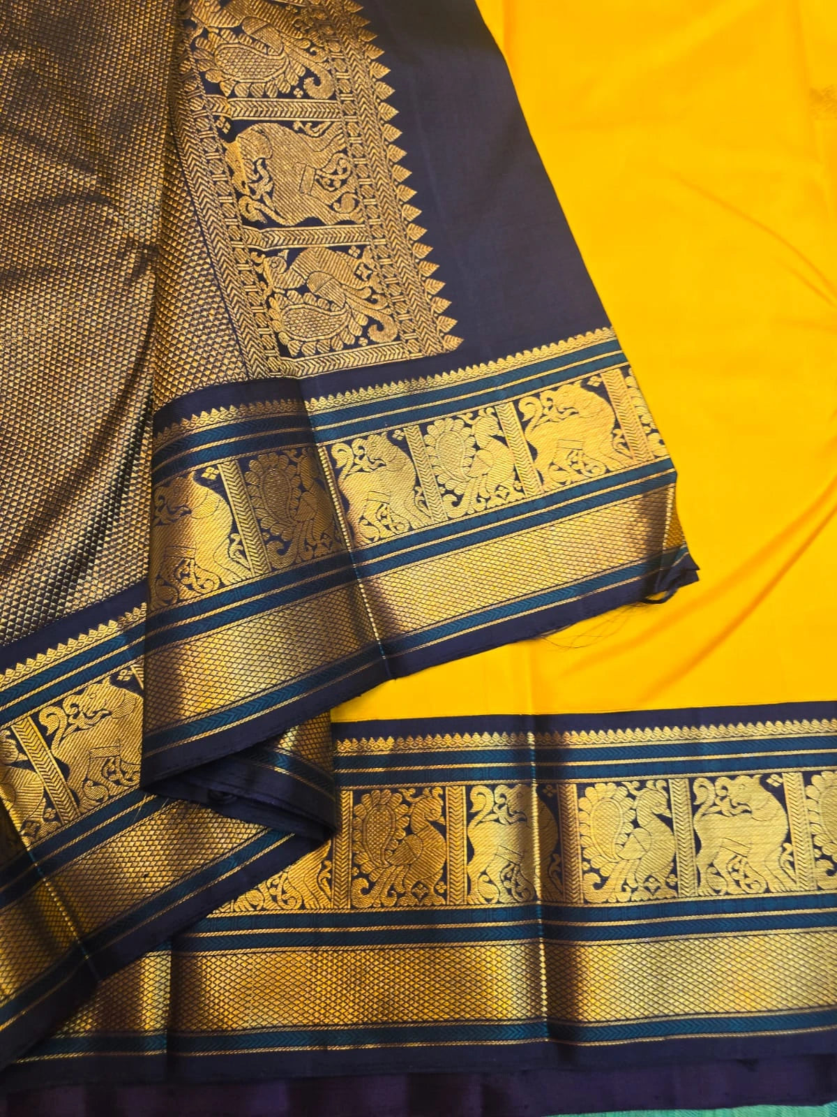 2G Pure Korvai Kanjivaram Silk Saree in Yellow with Black & Bottle Green Zari Peacock Border and Rich Traditional Zari Pallu | Silkmark Certified