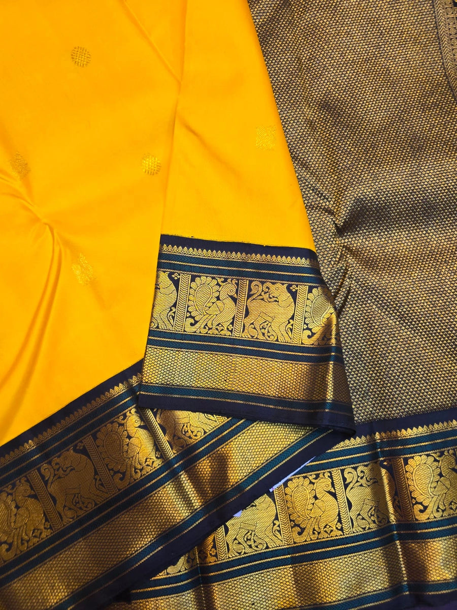 2G Pure Korvai Kanjivaram Silk Saree in Yellow with Black & Bottle Green Zari Peacock Border and Rich Traditional Zari Pallu | Silkmark Certified