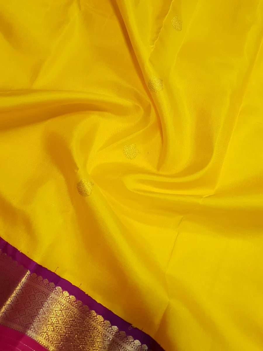 2G Pure Kanjivaram Silk Saree in Bright Yellow with Magenta Broad Zari Border & Grand Zari Pallu | Silkmark Certified