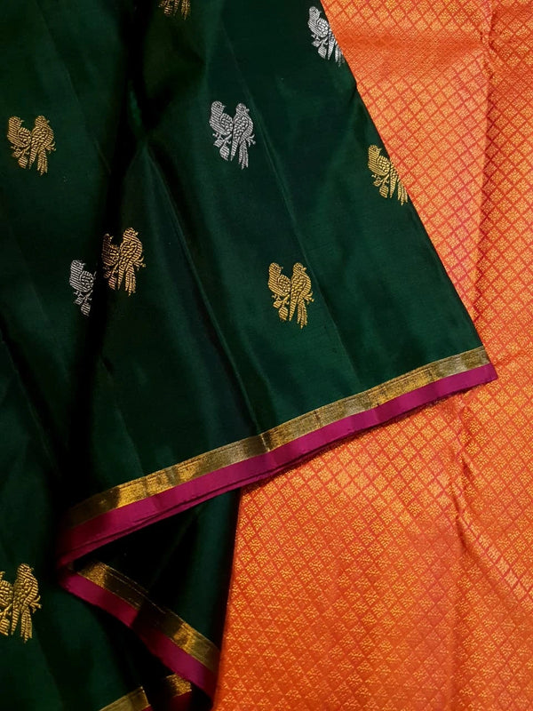 2G Pure Kanjivaram Silk Saree in Deep Bottle Green with Magenta Gold Zari Border & Coral Orange Parrot Butta Pallu | Silkmark Certified