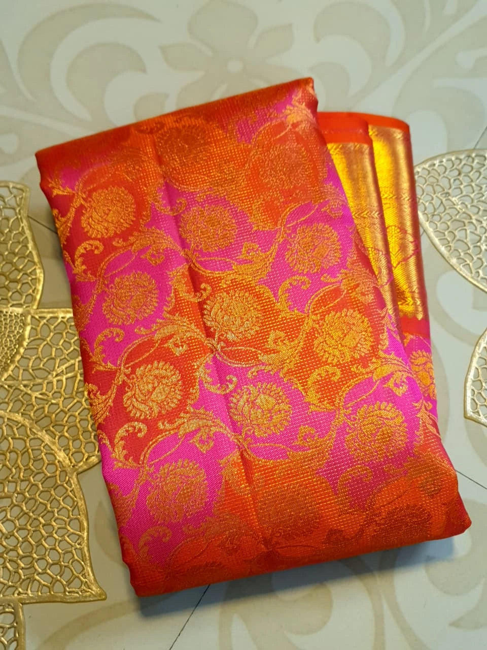 2G Pure Kanjivaram Silk Saree in Vibrant Orange with Pink Floral Brocade, Rich Gold Zari Border & Traditional Zari Pallu | Silkmark Certified