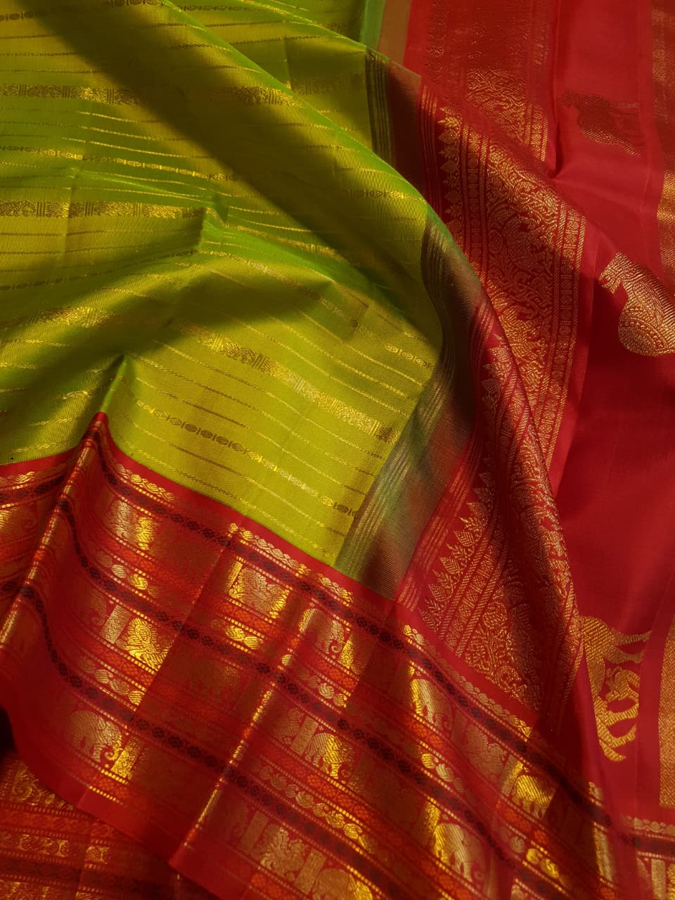 2G Pure Kanjivaram Silk Saree in Lime Green with Red Elephant & Peacock Zari Border and Rich Zari Pallu | Silkmark Certified
