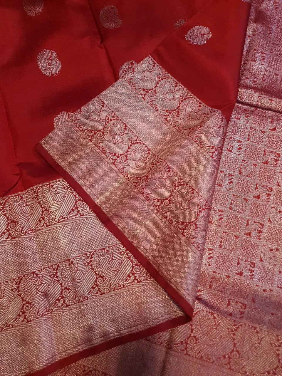 2G Pure Kanjivaram Silk Saree in Rich Red with Silver Zari Peacock Buttas and Intricate Floral Brocade Pallu | Silkmark Certified