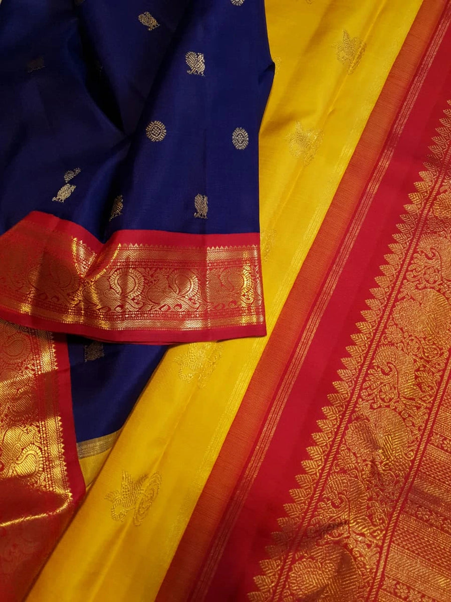3G Pure Zari Ganga Jamuna Kanjivaram Silk Saree in Navy Blue with Gold Peacock Buttas & Red and Yellow Peacock Border | Silkmark Certified
