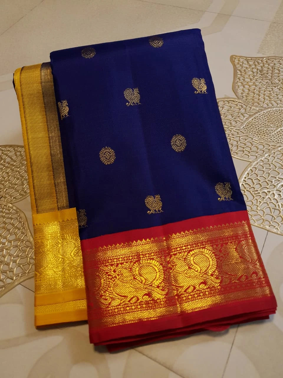 3G Pure Zari Ganga Jamuna Kanjivaram Silk Saree in Navy Blue with Gold Peacock Buttas & Red and Yellow Peacock Border | Silkmark Certified