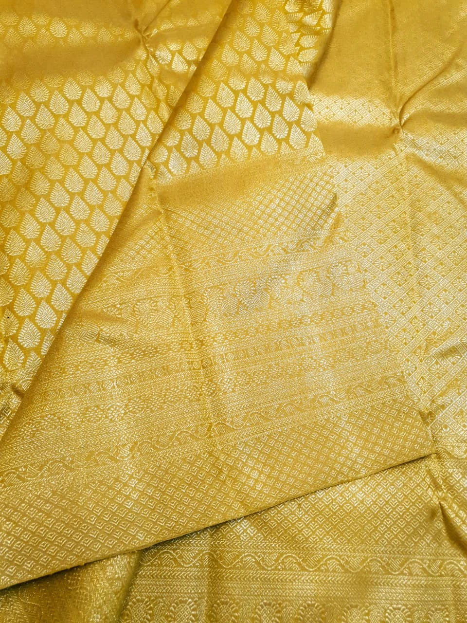 2G Pure Kanjivaram Silk Saree in Golden Yellow with Full-Body Leaf Motifs & Rich Gold Zari Peacock Border | Silkmark Certified