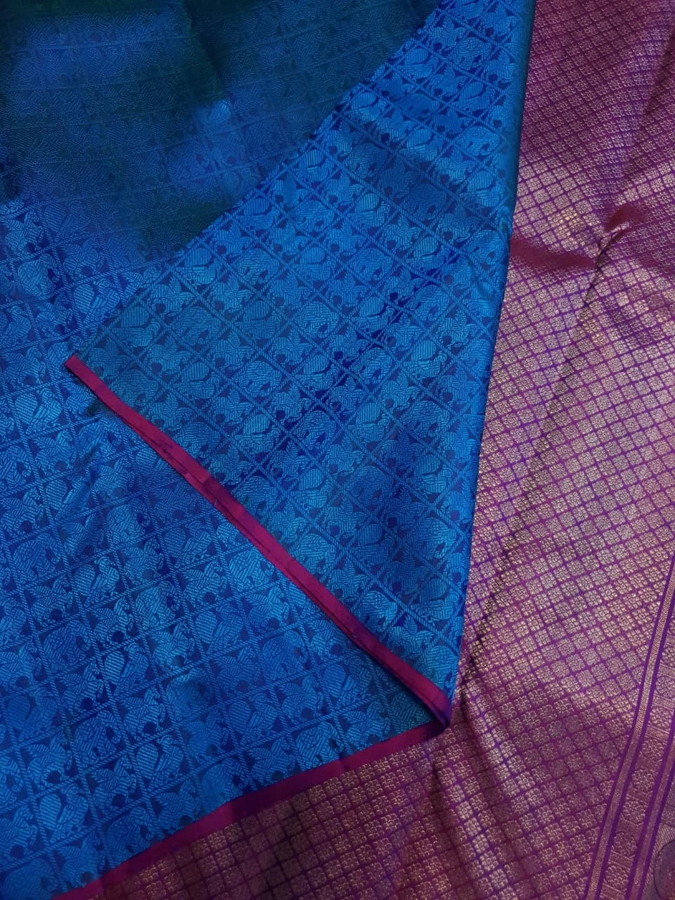 3G Pure Zari Kanjivaram Silk Saree in Ananda Blue with Traditional Elephant & Peacock Zari Motifs and Purple Border | Silkmark Certified