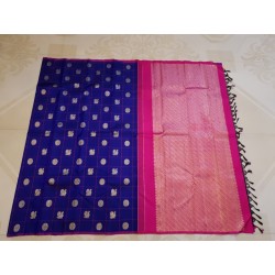 Royal Blue Borderless Kanchivaram with Mayil Chakram Buttas and Rani Pink Silver Zari Pallu