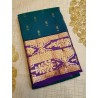 Peacock blue designer silk saree with dark navy Body motifs