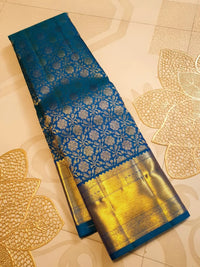 2G Kanjivaram Silk Saree in Peacock Blue with Rich Gold Zari Floral Brocade & Traditional Broad Border | Silkmark Certified