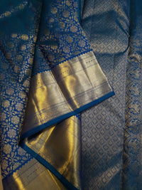 2G Kanjivaram Silk Saree in Peacock Blue with Rich Gold Zari Floral Brocade & Traditional Broad Border | Silkmark Certified