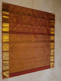 2G Pure Kanjivaram Silk Saree in Rust Brown with Rich Gold Zari Peacock Butta & Traditional Broad Border | Silkmark Certified