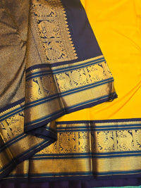 2G Pure Korvai  Kanjivaram Silk Saree in Yellow with Black & Bottle Green Zari Peacock Border and Rich Traditional Zari Pallu | Silkmark Certified
