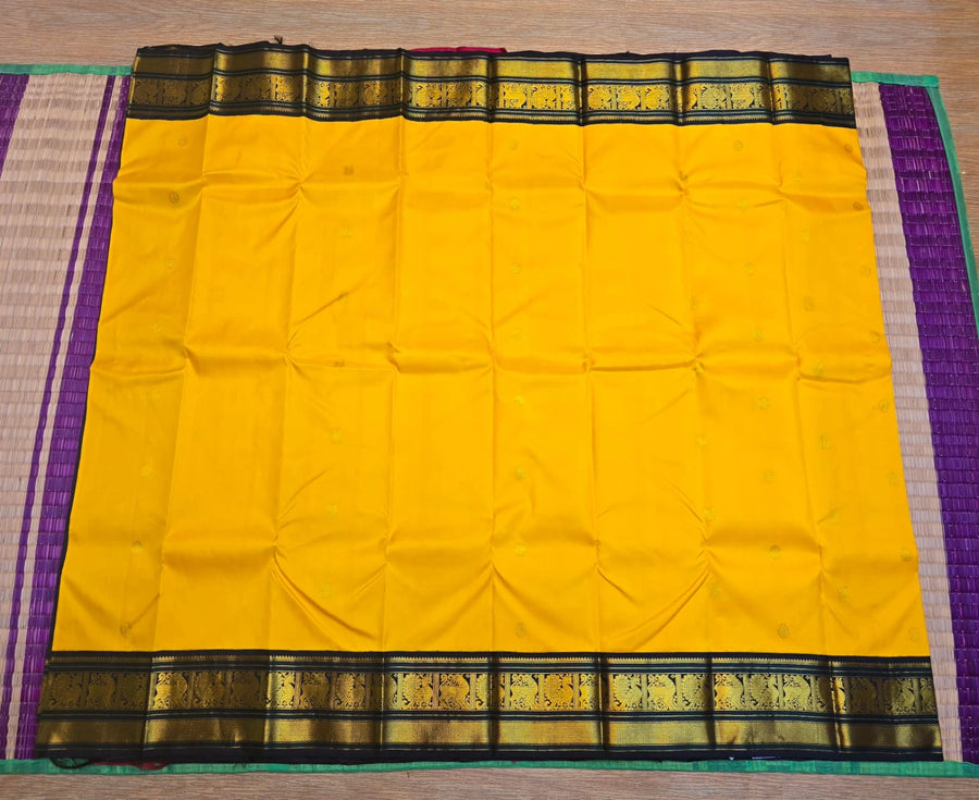 2G Pure Korvai  Kanjivaram Silk Saree in Yellow with Black & Bottle Green Zari Peacock Border and Rich Traditional Zari Pallu | Silkmark Certified