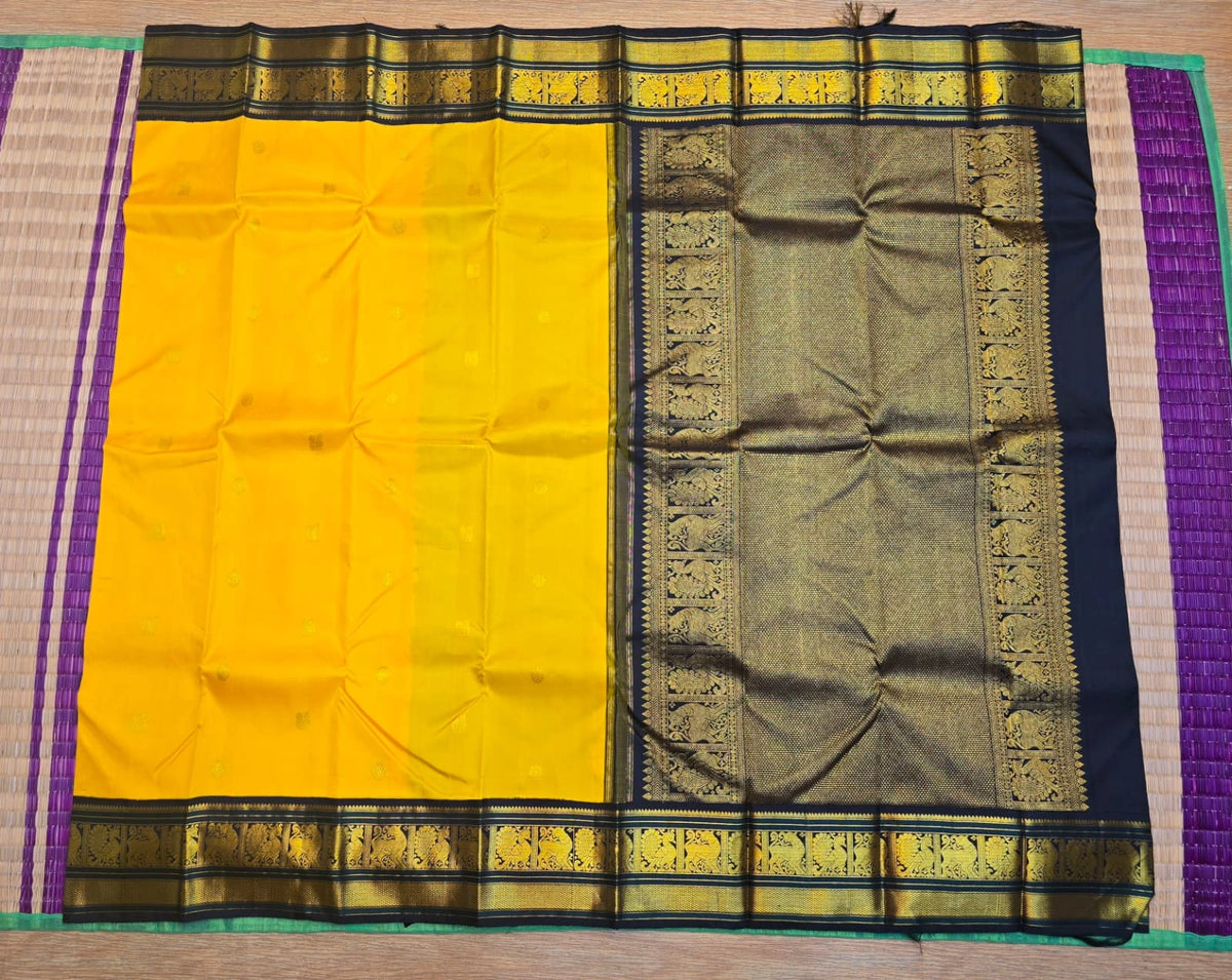 2G Pure Korvai  Kanjivaram Silk Saree in Yellow with Black & Bottle Green Zari Peacock Border and Rich Traditional Zari Pallu | Silkmark Certified