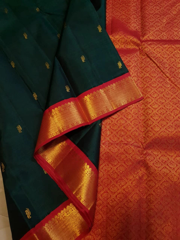 2 Gram Pure Zari Korvai Kanjivaram Silk Saree in Deep Bottle Green with Red Border & | Silkmark Certified