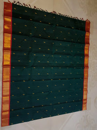 2 Gram Pure Zari Korvai Kanjivaram Silk Saree in Deep Bottle Green with Red Border & | Silkmark Certified
