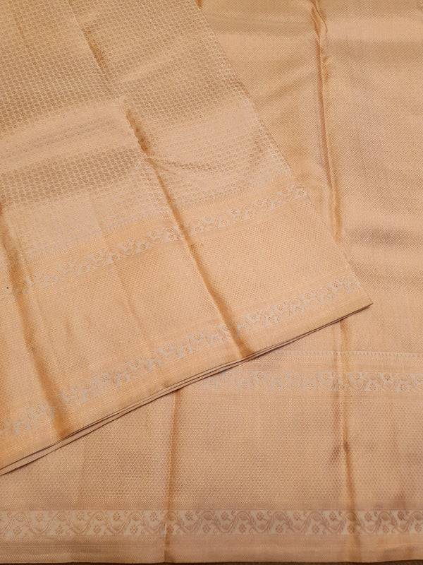 2G Pure Kanjivaram Silk Saree in Cream with All-Over Zari Buttas & Rich Copper Zari Border | Silkmark Certified