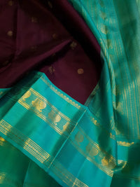 2G Pure Korvai Kanjivaram Silk Saree in Deep Wine with Turquoise Green & Gold Zari Border and Traditional Butta Weave | Silkmark Certified