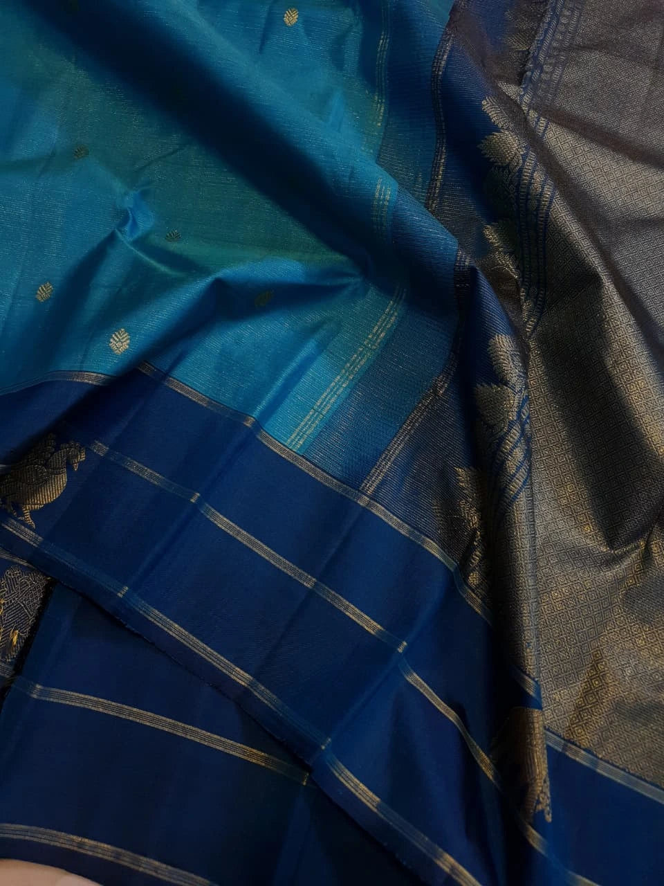 2G Pure Kanjivaram Silk Saree in Turquoise Blue with Navy Blue Elephant Zari Border & Small Zari Buttas | Silkmark Certified
