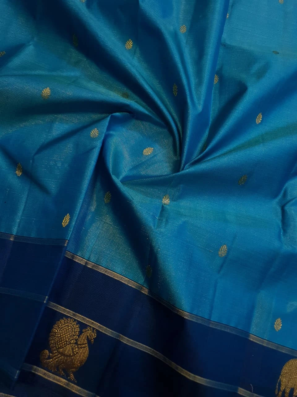 2G Pure Kanjivaram Silk Saree in Turquoise Blue with Navy Blue Elephant Zari Border & Small Zari Buttas | Silkmark Certified
