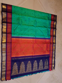 3Gram Pure Zari Kanjivaram Silk Saree in Rexona Green with Magenta & Navy Blue Border, Rich Gold Zari Pallu & Traditional Motifs | Zari Certified & Silkmark Certified