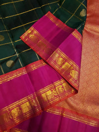 2G Kanjivaram Silk Saree in Deep Bottle Green with Magenta Contrast Border & Peacock Butta | Silkmark Certified