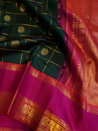 2G Kanjivaram Silk Saree in Deep Bottle Green with Magenta Contrast Border & Peacock Butta | Silkmark Certified