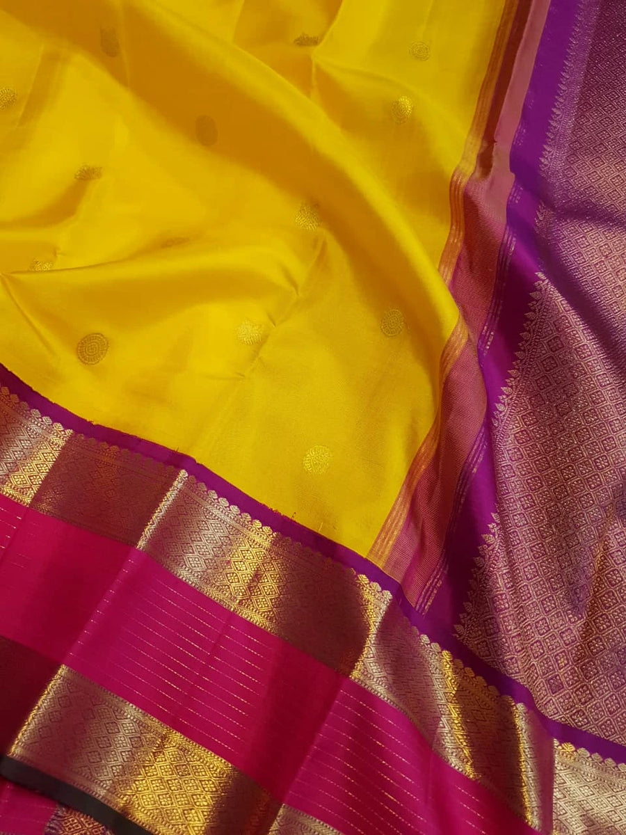 2G Pure Kanjivaram Silk Saree in Bright Yellow with Magenta Broad Zari Border & Grand Zari Pallu | Silkmark Certified