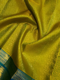 2G Pure Kanjivaram Silk Saree in Lime Green with Teal Blue Peacock Zari Border & Grand Gold Zari Pallu | Silkmark Certified