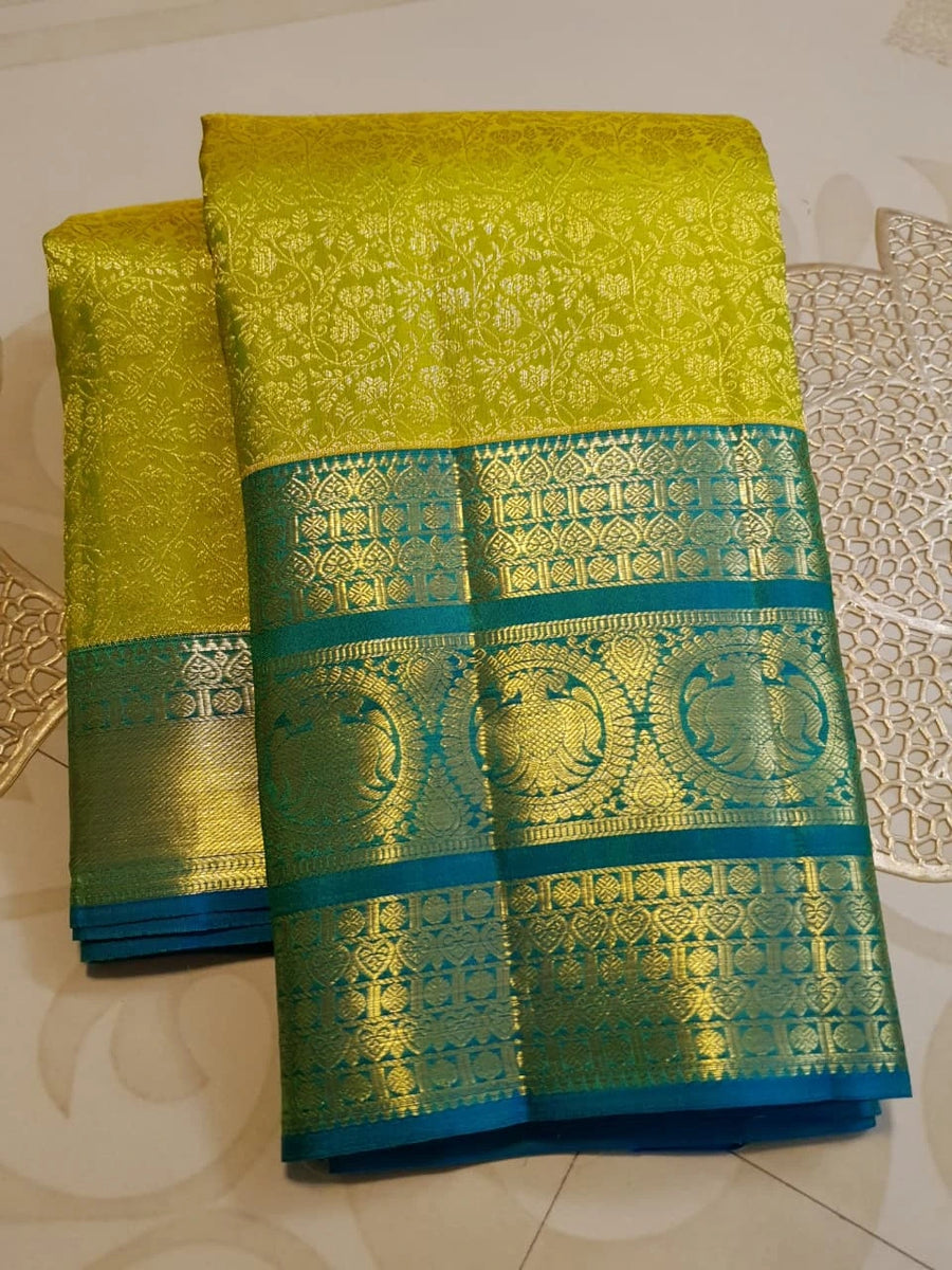 2G Pure Kanjivaram Silk Saree in Lime Green with Teal Blue Peacock Zari Border & Grand Gold Zari Pallu | Silkmark Certified
