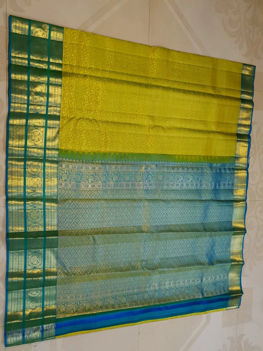 2G Pure Kanjivaram Silk Saree in Lime Green with Teal Blue Peacock Zari Border & Grand Gold Zari Pallu | Silkmark Certified