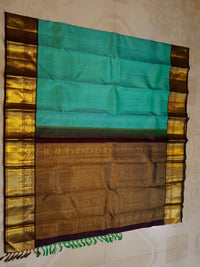 2G  Pure Korvai Kanjivaram Silk Saree in Turquoise Green with Black Checks, Brown Peacock Zari Border & Rich Gold Zari Pallu | Silkmark Certified