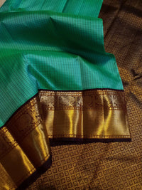 2G  Pure Korvai Kanjivaram Silk Saree in Turquoise Green with Black Checks, Brown Peacock Zari Border & Rich Gold Zari Pallu | Silkmark Certified