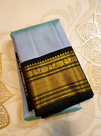 2G Pure Kanjivaram Silk Saree in Pastel Blue with Black Peacock Zari Border & Rich Gold Zari Pallu | Silkmark Certified