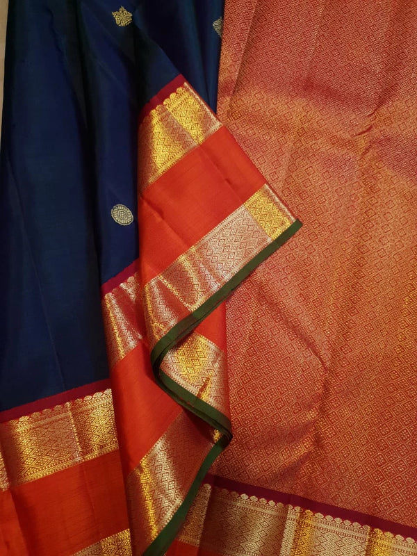 2G Pure Kanjivaram Silk Saree in Navy Blue with Peacock Butta & Orange-Red Broad Gold Zari Border | Silkmark Certified