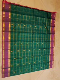 2G Pure Kanjivaram Silk Saree in Bottle Green with Magenta Purple Zari Border, Gold Zari Checks & Peacock Butta | Silkmark Certified