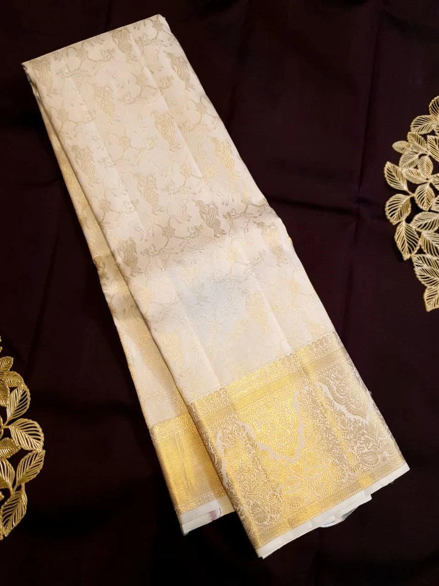 2 Gram Pure Kanjivaram Silk Saree in Cream with Rich Gold Zari Floral Motifs, Broad Zari Border & Traditional Lord Krishna Pallu | Silkmark Certified