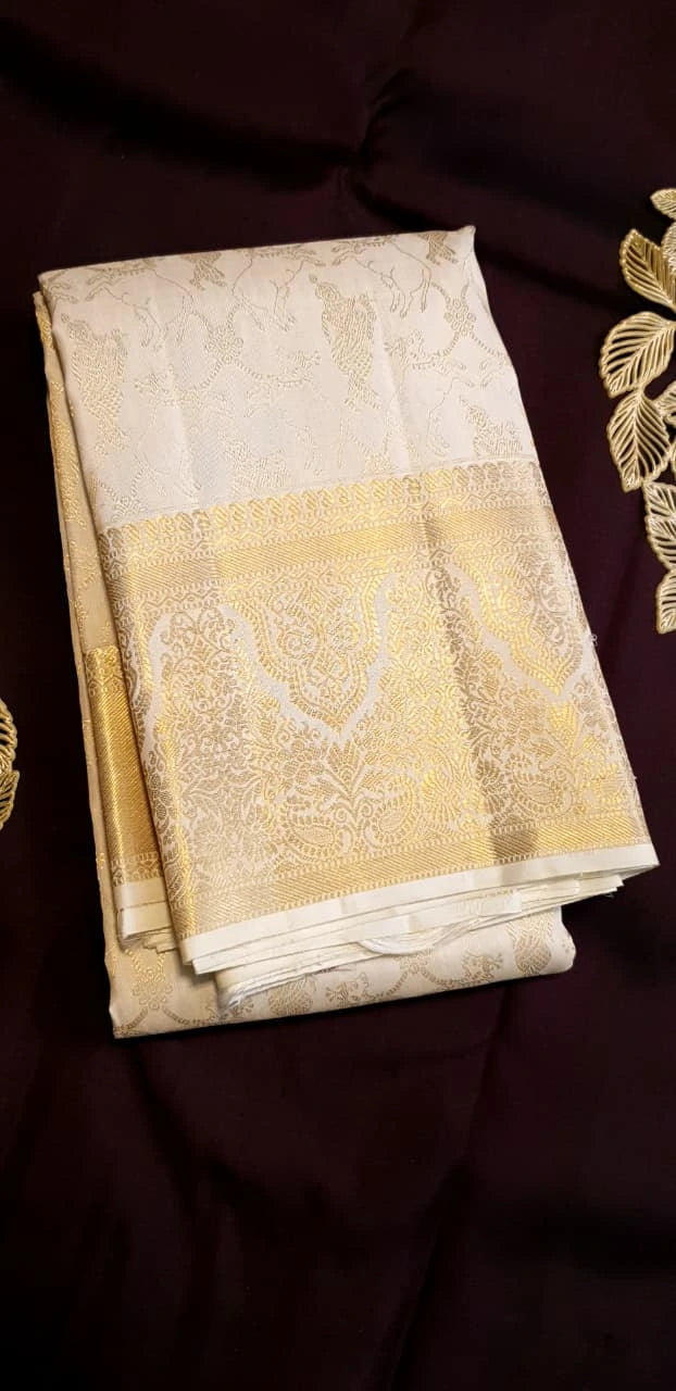 2 Gram Pure Kanjivaram Silk Saree in Cream with Rich Gold Zari Floral Motifs, Broad Zari Border & Traditional Lord Krishna Pallu | Silkmark Certified