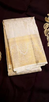 2 Gram Pure Kanjivaram Silk Saree in Cream with Rich Gold Zari Floral Motifs, Broad Zari Border & Traditional Lord Krishna Pallu | Silkmark Certified