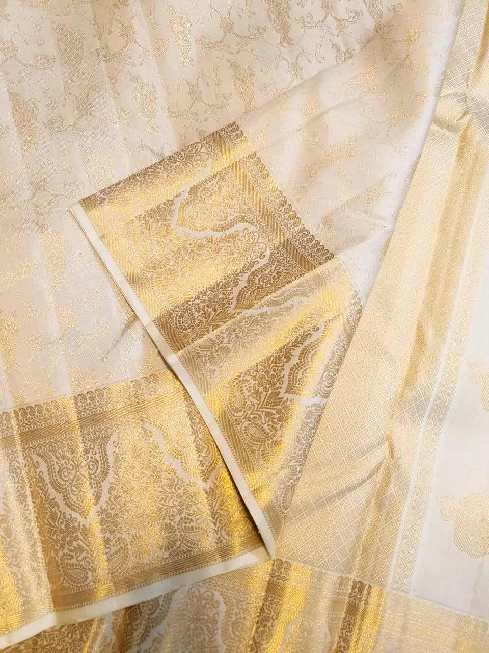 2 Gram Pure Kanjivaram Silk Saree in Cream with Rich Gold Zari Floral Motifs, Broad Zari Border & Traditional Lord Krishna Pallu | Silkmark Certified
