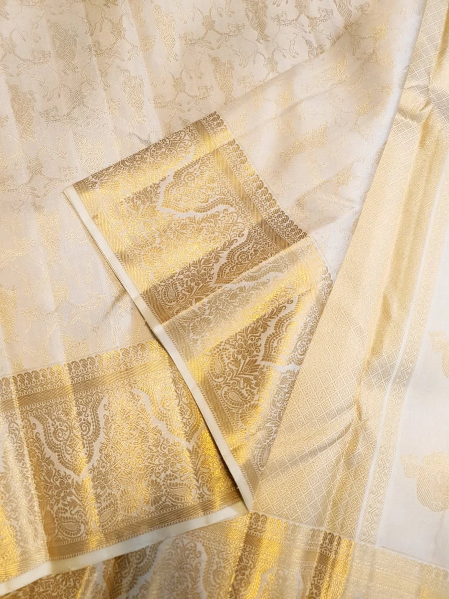 2 Gram Pure Kanjivaram Silk Saree in Cream with Rich Gold Zari Floral Motifs, Broad Zari Border & Traditional Lord Krishna Pallu | Silkmark Certified