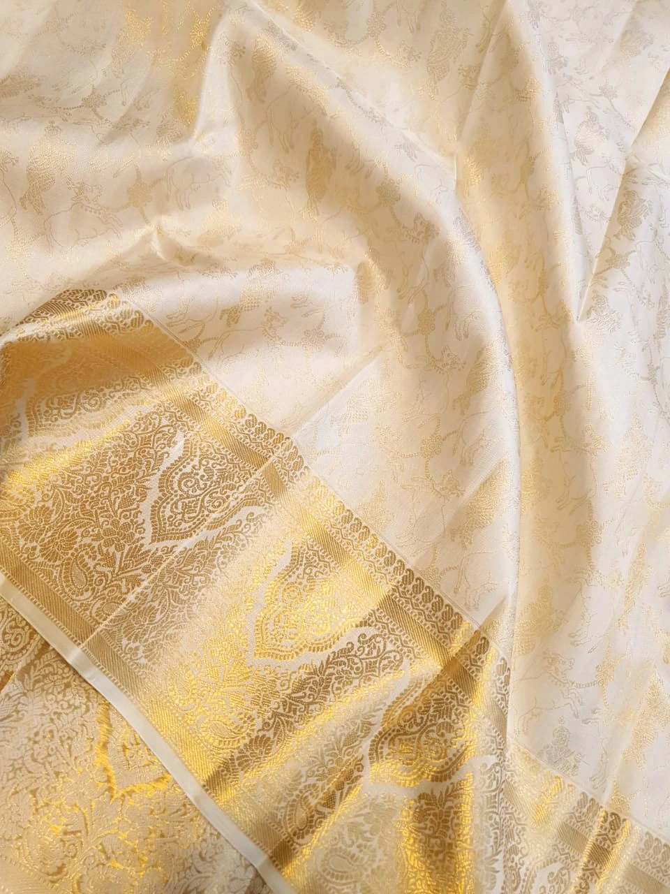 2 Gram Pure Kanjivaram Silk Saree in Cream with Rich Gold Zari Floral Motifs, Broad Zari Border & Traditional Lord Krishna Pallu | Silkmark Certified
