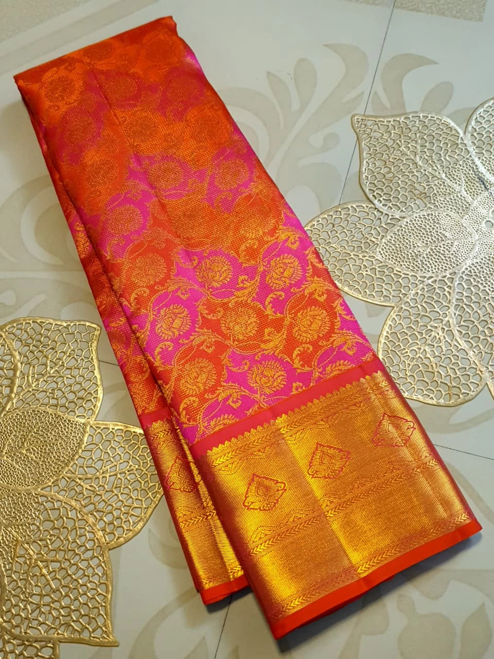 2G Pure Kanjivaram Silk Saree in Vibrant Orange with Pink Floral Brocade, Rich Gold Zari Border & Traditional Zari Pallu | Silkmark Certified