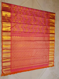 2G Pure Kanjivaram Silk Saree in Vibrant Orange with Pink Floral Brocade, Rich Gold Zari Border & Traditional Zari Pallu | Silkmark Certified