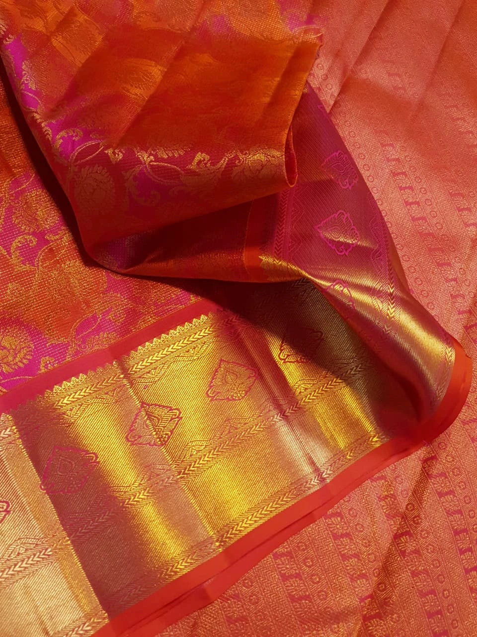 2G Pure Kanjivaram Silk Saree in Vibrant Orange with Pink Floral Brocade, Rich Gold Zari Border & Traditional Zari Pallu | Silkmark Certified