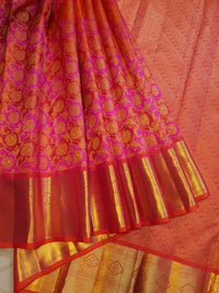 2G Pure Kanjivaram Silk Saree in Vibrant Orange with Pink Floral Brocade, Rich Gold Zari Border & Traditional Zari Pallu | Silkmark Certified