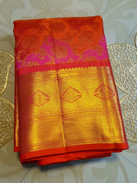 2G Pure Kanjivaram Silk Saree in Vibrant Orange with Pink Floral Brocade, Rich Gold Zari Border & Traditional Zari Pallu | Silkmark Certified