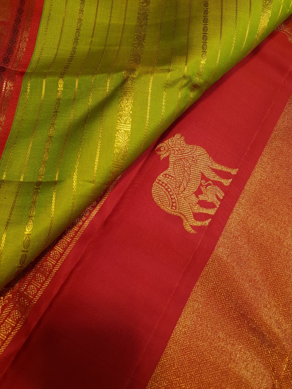 2G Pure Kanjivaram Silk Saree in Lime Green with Red Elephant & Peacock Zari Border and Rich Zari Pallu | Silkmark Certified